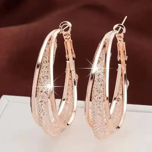 Elegant RozGold Crystal Hoop Earrings with a Twisted Metal Design